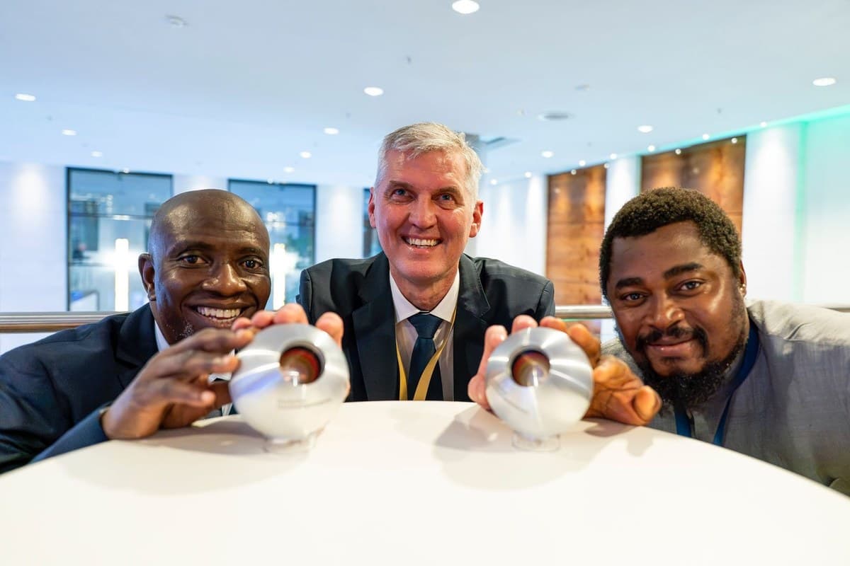 Nigerian partners with Guido Pusch (Family & Care International) at DNP25 Düsseldorf